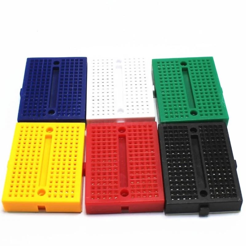 SYB-170-linkable-mini-breadboard-170-holes-small-size-breadboard-in-Pakistan.jpg 4.6cm x 3.5cm SYB-170 Breadboard Solderless Prototype Board